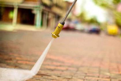 A street being powerwashed in Albuquerque